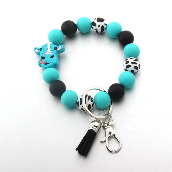 O1CN01Pzm5iN1bYW4uJhRSc_2216822363477-0-cib Wholesale Cartoon Animal Western Cowboy Silicone Tassel Bracelet Keychain