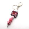 O1CN01Q3omGy1bYW4wJA53g_2216822363477-0-cib Wholesale Cartoon Silicone Beads Acrylic Beads Teacher Keychain