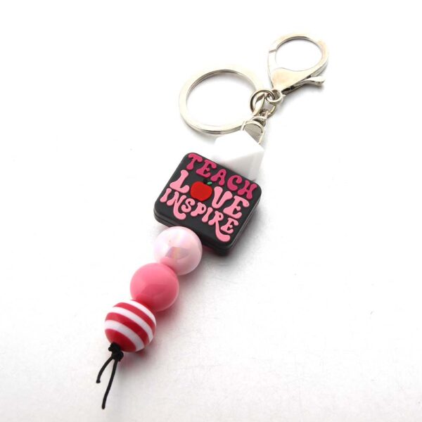 O1CN01Q3omGy1bYW4wJA53g_2216822363477-0-cib Wholesale Cartoon Silicone Beads Acrylic Beads Teacher Keychain