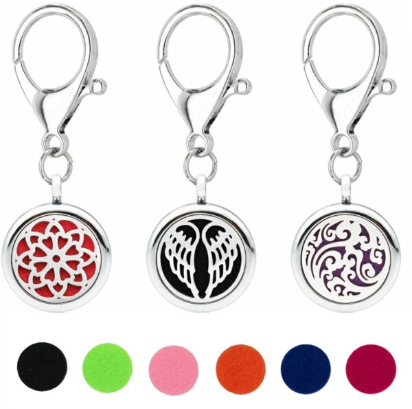 Wholesale 25MM Alloy Hollow New Flower Wings Aromatherapy Essential Oil Keychain