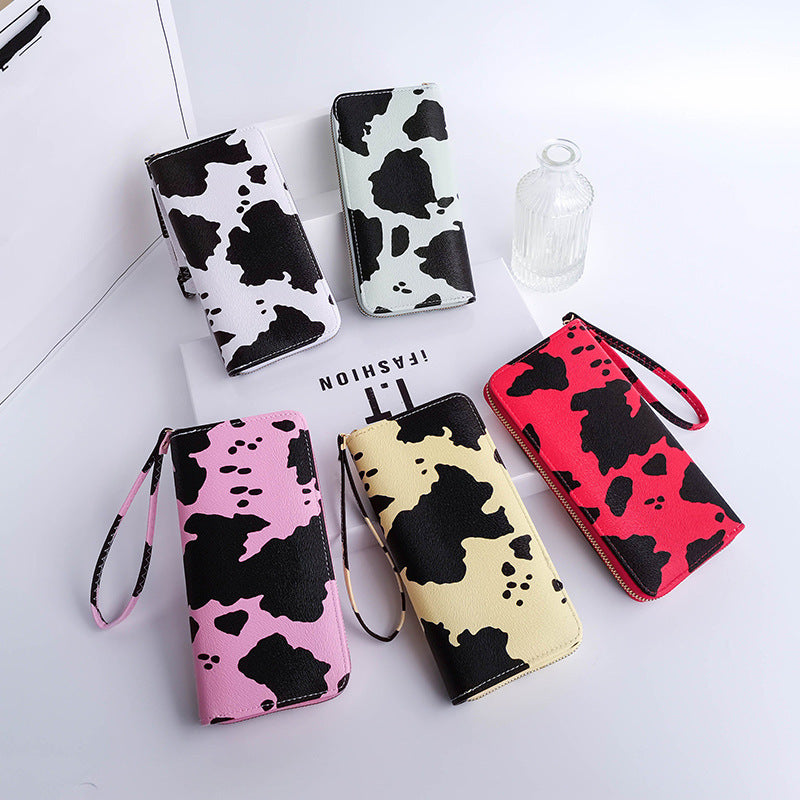 Wholesale PU Contrasting Cow Pattern Multi Compartment Wallet Long Horizontal Carrying Bag