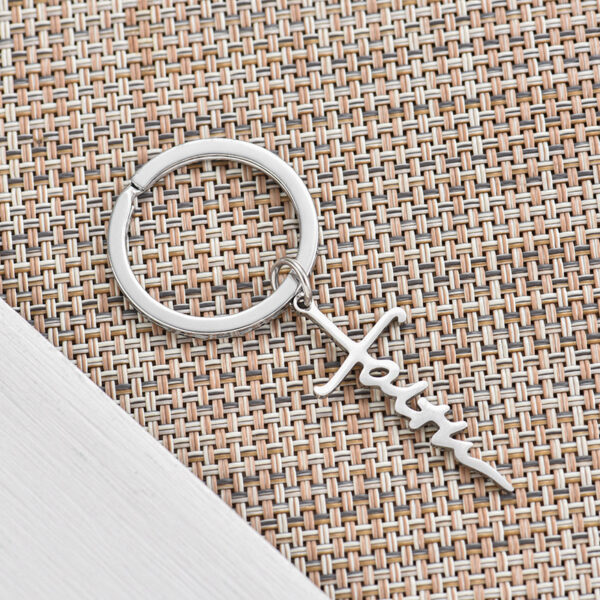 O1CN01QbNLcm2CMH827hXxu_1625548459-0-cib Wholesale Stainless Steel Alphabet Cross Keychain