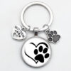 O1CN01Qmjtl51hoRS6jl5A3_2216197114324-0-cib Wholesale Love Cat Pet Footprints Dog Glass Convex Round Metal Keychains