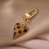 O1CN01RV2iiL215pA3J5NeW_4097876934-0-cib Wholesale Minimalist Grid Heart Alloy Keychains