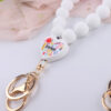 O1CN01RWabHo1NrNiGWh5qK_2214899881623-0-cib Wholesale Cartoon Love Printed Silicone Beaded Wrist Keychain