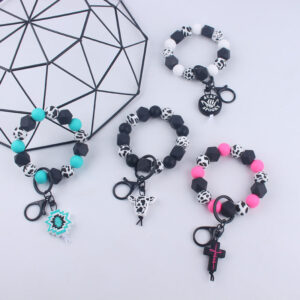 Wholesale Cartoon Bull Head Aztec Cross Silicone Beaded Wrist Keychain