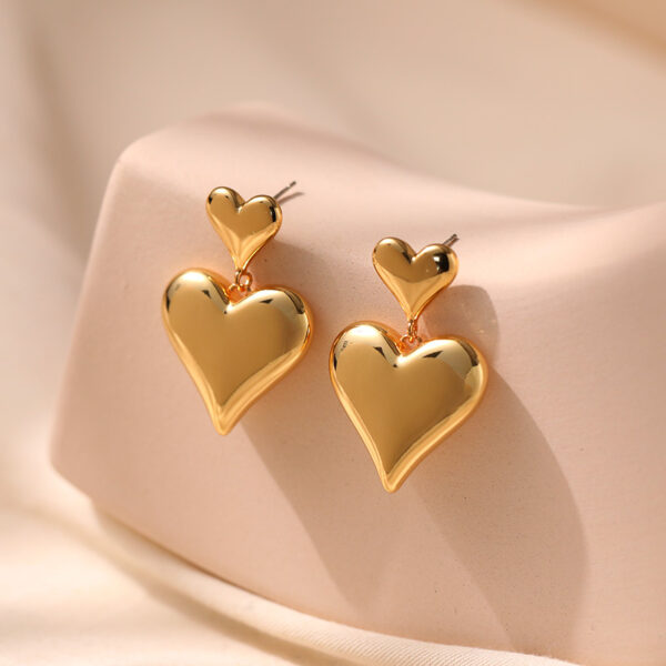O1CN01Raz2gh1EhSWetTWKM_2210915660383-0-cib Wholesale Three-dimensional Love High-grade Metallic Gold-plated Earrings