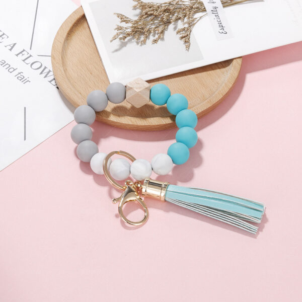 O1CN01S4VROi1iSk7v5EraY_3527034412-0-cib-2 Wholesale Silicone Beaded PU Leather Tassel Wristlet Keychain