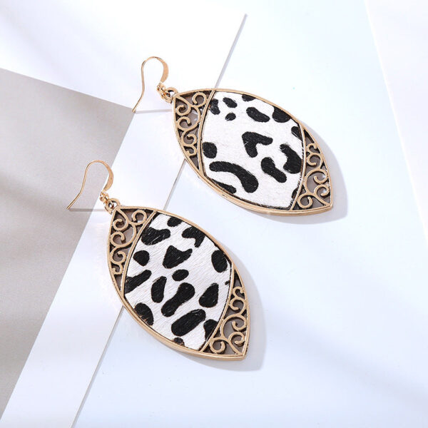 O1CN01ST4uV92LDsVyNFSUi__2206398079659-0-cib Wholesale Alloy Diamond Cow Pattern Leather Earrings