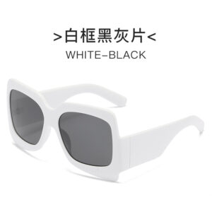 White frame black and gray piece