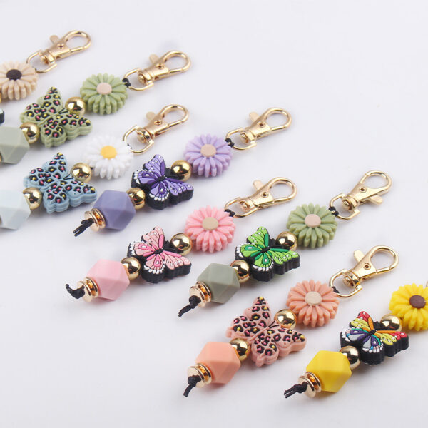 O1CN01SrOQcb1NrNlayJai6_2214899881623-0-cib Wholesale Cartoon Colorful Butterfly Silicone Beaded Lanyard Keychain