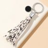 O1CN01T1VpGN1bFjfGjfnpk_2857743436-0-cib Wholesale PU Cow Pattern Tassel Keychain