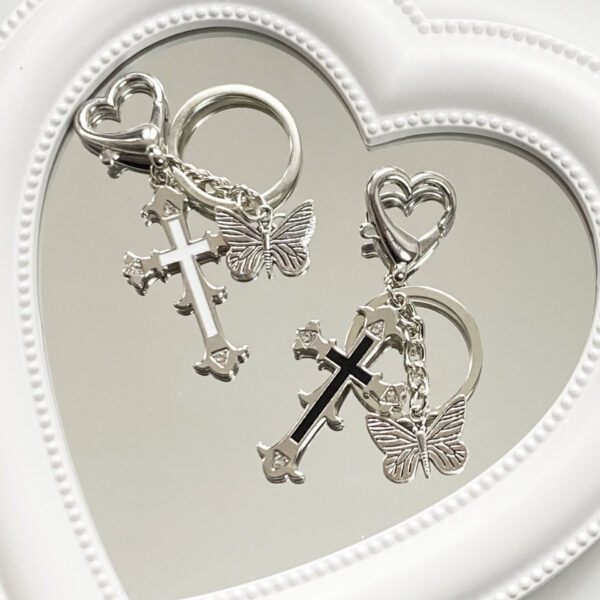 O1CN01THKsVz20rcr68tvsZ_2215108276903-0-cib Wholesale Cross Butterflies Keychains
