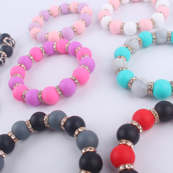 O1CN01ToVbq01NrNfZgRGyB_2214899881623-0-cib-2 Wholesale Silicone Beaded Tassel Wrist Keychain