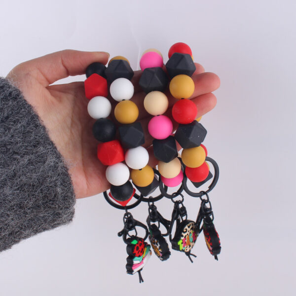 O1CN01Tw6JER1NrNila8Tq8_2214899881623-0-cib-1 Wholesale Cartoon Apple Teacher Pencil Silicone Beaded Wrist Keychain