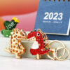 O1CN01UQi3Mu2MmyOsdnJdS_2204146159871-0-cib Wholesale Water Diamond Dinosaur Doll Zinc Alloy Keychain