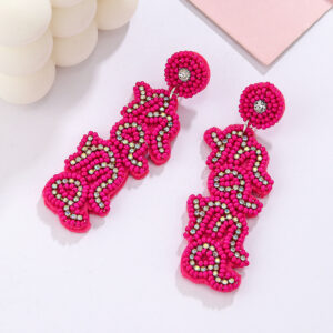 "a pair of rose red english ""mama"" rice bead earrings"