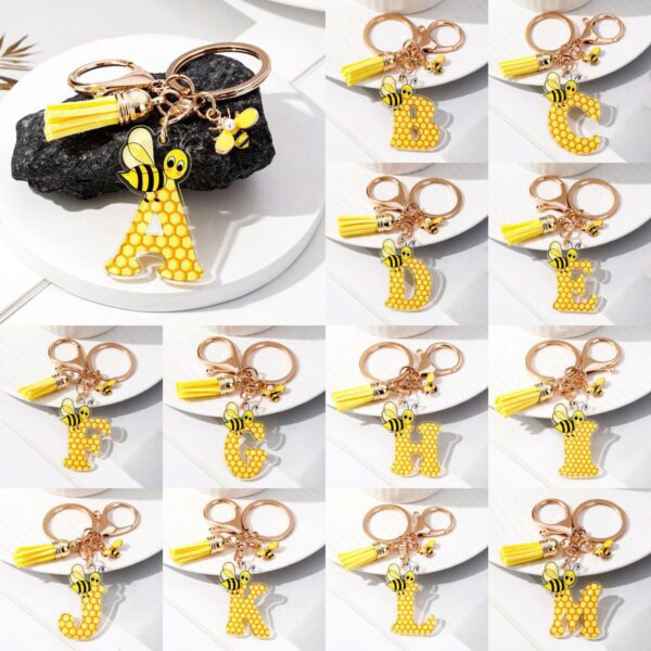 Wholesale Bee Honeycomb Acrylic English Letter Tassel Bee Enamel Keychain