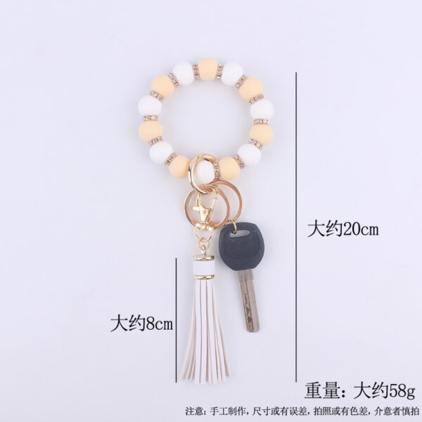 O1CN01UjkcQL1NrNfTWxfQY_2214899881623-0-cib-3 Wholesale Silicone Beaded Tassel Wrist Keychain