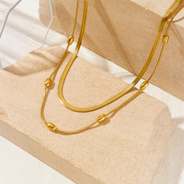 O1CN01UqbOHp1TS5X1ADKj7_3476002380-0-cib Wholesale Rice Grain Bead Blade Chain Double Layer Stacked Titanium Steel Necklace