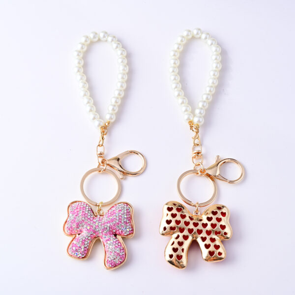 O1CN01UxCZij2GKDxSSenuY_2208315888996-0-cib Wholesale Full Diamond Bow Car Creative Pearl Bracelet Keychains