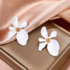 O1CN01VC6AOS1g7Yd3MsL6E_3975744095-0-cib Wholesale 3D Flower Alloy Earrings
