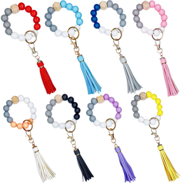 O1CN01WNJpc71bFjdAZ4pZq_2857743436-0-cib-1 Wholesale Wood Imitation Silicone Beads Tassel Wrist Keychain