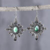 O1CN01WnYqBA2Lo3oBK1gKc_2216053279738-0-cib Wholesale Fashion Bohemian Style Turquoise Daisy Flower Earrings