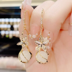 Wholesale Zircon Five Petal Flower Cat Eye Stone Personalized Fashion Temperament Earrings