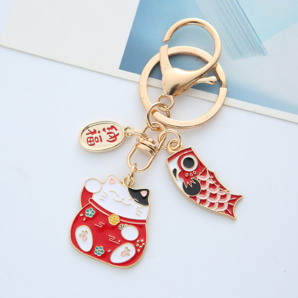 O1CN01WqQ5P41JVcDoSLmtx_2208113251034-0-cib Wholesale Japanese Lucky Cat Drip Oil Alloy Keychains