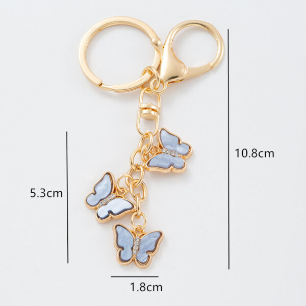 O1CN01X5pbSe1VbMqAnQYQB_2146522671-0-cib Wholesale Zinc Alloy Butterfly Keychain