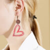Wholesale Valentine's Day Fashion Hollow Heart Wood Slice Women's Earrings