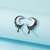 O1CN01XORSyZ2MGueEc2kTx_2211772399801-0-cib Wholesale Punk Diablo Melting Moon Alloy Earrings
