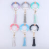 O1CN01XtQQPD1NrNf67ybjn__2214899881623-0-cib-1 Wholesale Silicone Beaded Tassel Wrist Keychain