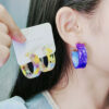 O1CN01Y5eclN1T3M5gwbFMV_2677772326-0-cib Wholesale Geometric C Circle Acetate Translucent Ripple Earrings