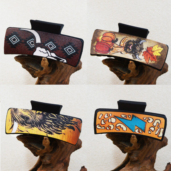 O1CN01YFie7u2HKyB0ObQlf_3294559133-0-cib Wholesale of Western Wind Cow Plastic Hair Clips and Shark Clips