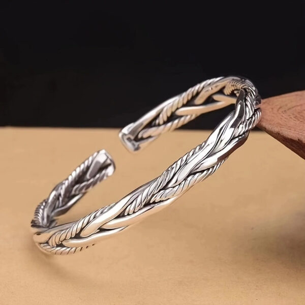 O1CN01YOdutp1lsLKRFEH4k_2208865594874-0-cib Wholesale Vintage Silver Twist Braided Open Adjustable Bracelet