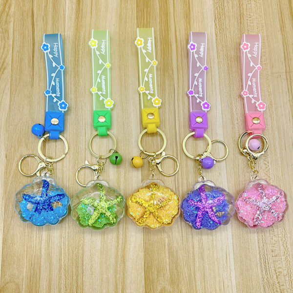 O1CN01ZLpKdB2J01Lf9U7rO_2211702189358-0-cib Wholesale Starfish Floating Bottle Acrylic Liquid Keychain