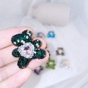 Dark green starry bear