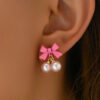 O1CN01aMVj2t1TX7xWZUYZF_2208880022391-0-cib Wholesale Simple Bow Inlaid Pearl Earrings