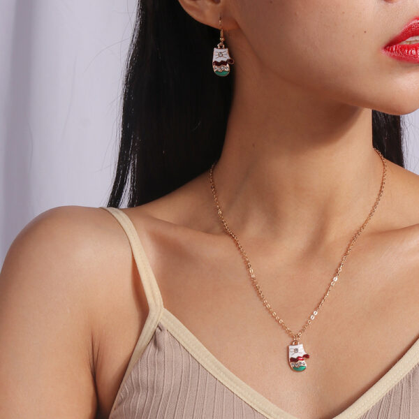 O1CN01aRHgJj1vac31Vso37_2866776189-0-cib Wholesale Christmas Elk Cane Christmas Tree Snowman Alloy Necklaces Set