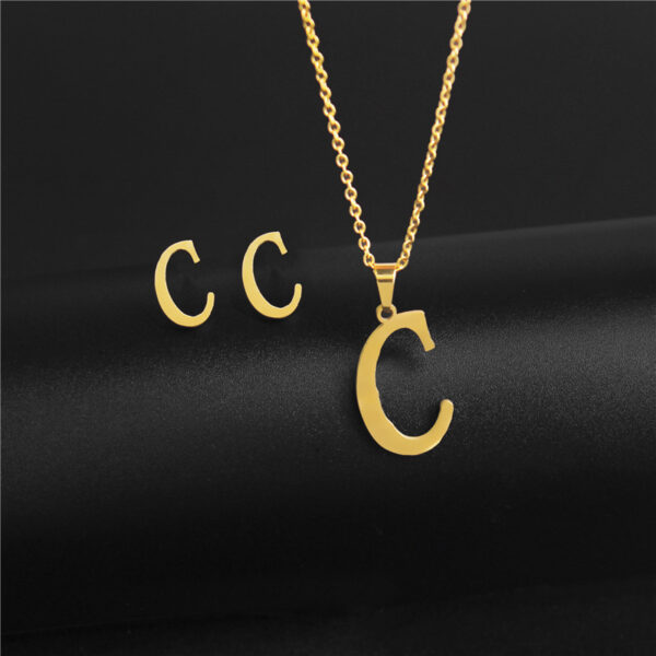 O1CN01annIxc2BhVoMbc4wf_2207598918370-0-cib Wholesale Stainless Steel 26 Letter Necklace Earrings Two Piece Set