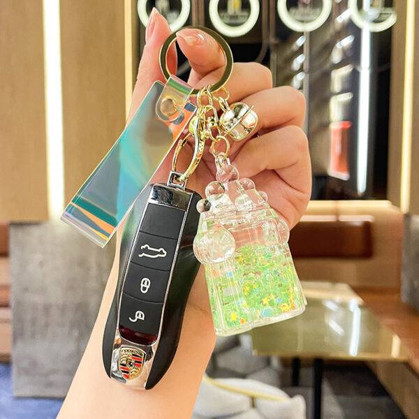 Wholesale New Acrylic Oiled Luminous Castle Quicksand Bottle Keychain