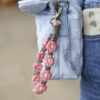 Wholesale Alloy Small Daisy Wristband Keychain
