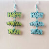 O1CN01b6rGiV1YkvuTWEb6J_2216150023098-0-cib Wholesale Happy New Year English Letters Christmas Acrylic Earrings