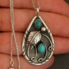 Wholesale Inlaid Turquoise Retro Dyed Black Feather Alloy Pendants