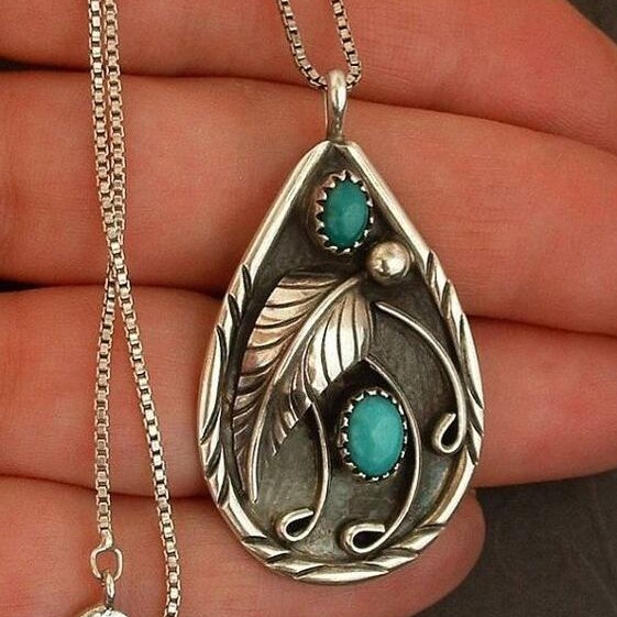 Wholesale Inlaid Turquoise Retro Dyed Black Feather Alloy Pendants