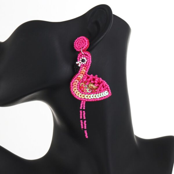 O1CN01c4yenO1q6Js2lipwf_2916055446-0-cib Wholesale Pink Flamingo Fabric Art Rice Beads Handmade Tassel Earrings