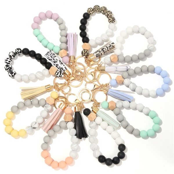 O1CN01cAYKth1b721xEzOfB_2208367413417-0-cib-2 Wholesale Silicone Beads Tassels Bracelet Keychain