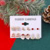 O1CN01cNy5UP1ZtvBescaiS_3833523253-0-cib Wholesale Christmas Santa Claus Drops Oil Snowflake Bells Christmas Tree Alloy Earrings